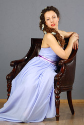 Beautiful woman in blue dress and long hair poses - paha_l