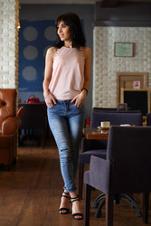 Young beautiful woman with black hair stands in - paha_l