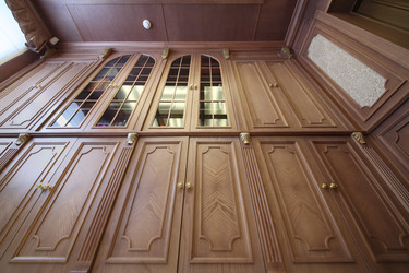 Facade of a wooden bookcase with glass inserts, - paha_l
