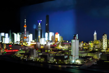 Miniature of modern city with illuminated - paha_l