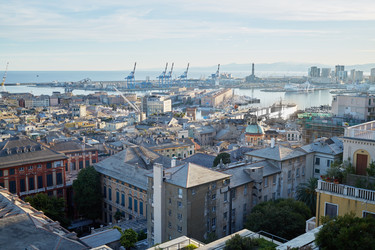 GENOA, ITALY - AUG 6, 2016: View at Port of Genoa with cranes and old - paha_l