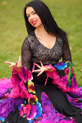 Young happy woman in beautiful skirt zingara poses - paha_l
