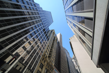 NEW YORK, USA - SEP 07, 2014: The facades of skyscrapers in the narrow - paha_l