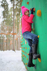 Portrait of a girl in a pink jacket and hat on a - paha_l