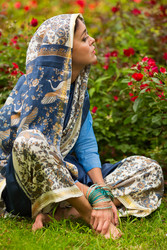 Middle age woman in blue sari and Indian adornment - paha_l
