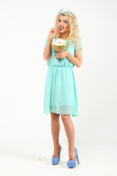 Beautiful girl with white hair stands with bowl of - paha_l
