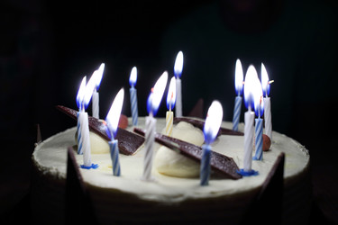 Chocolate cake with thirteen candles on birthday, - paha_l