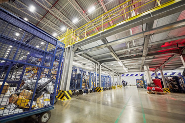RUSSIA, MOSCOW - DEC 16, 2014: Employees work in storage of automated - paha_l