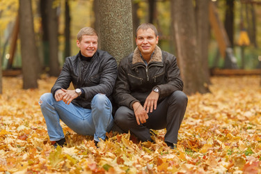 Two young man in black jacket in autumn park, - paha_l