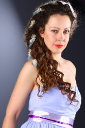 Beautiful woman in blue dress and long hair poses - paha_l