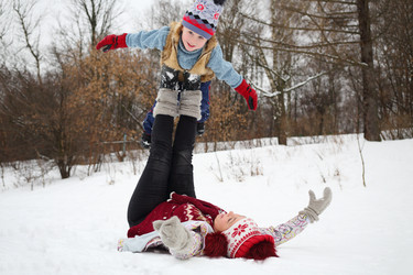 Woman lies on her back and holds little cute boy - paha_l