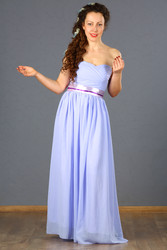 Beautiful woman in blue long dress smiles and - paha_l