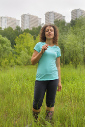 Portrait of young woman in full length in an urban - paha_l
