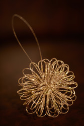 Golden christmas decoration on leather armchair, - paha_l