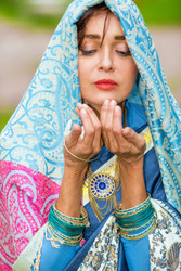 Middle age woman in blue sari and Indian adornment - paha_l