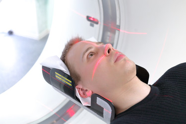 European man are entering brain with CT scan in - paha_l