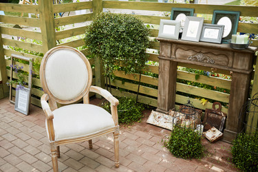 Wooden alcove with old armchair and different old - paha_l