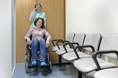 Nurse talking on phone and smile in hospital - paha_l