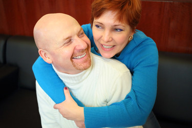 Portrait of laughing bald man and a red-haired - paha_l