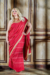 Smiling blonde woman in red dress stands near - paha_l