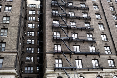 Fire escape on the wall of old brick building - paha_l