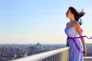 Girl brunette in blue dress with closing eyes - paha_l