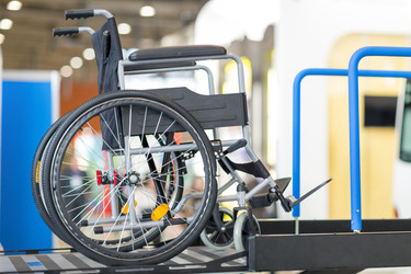 Wheelchair on the platform for entry into bus - paha_l
