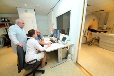 Three experienced physicians in control room, and - paha_l