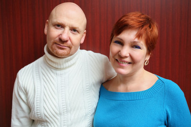 Portrait of a bald man in white sweater and a - paha_l