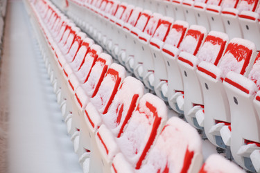 Rows of red empty seats of grandstands covered by - paha_l