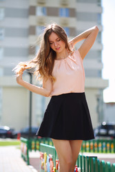 Pretty young woman with long hair walks outdoor at - paha_l