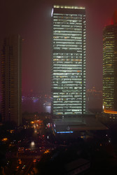 Skyscrapers with illumination, river with ship at - paha_l