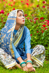Middle age woman in blue sari and Indian adornment - paha_l