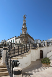 Ostuni square with Saint Orontius column. Apulia, Italy - alkir