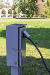 • Outdoor electrical junction utility box on green grass lawn. Objects - Pazemin