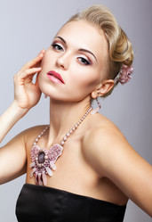 Blonde woman in black dress and necklace - Serg Zastavkin