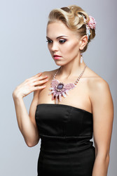 Blonde woman in black dress and necklace - Serg Zastavkin