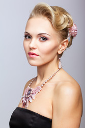 Blonde woman in black dress and necklace - Serg Zastavkin