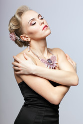Blonde woman in black dress and necklace - Serg Zastavkin