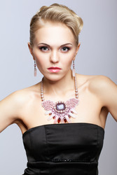 Blonde woman in black dress and necklace - Serg Zastavkin