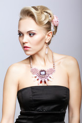 Blonde woman in black dress and necklace - Serg Zastavkin