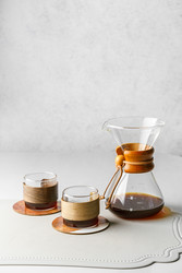 Preparing coffee in a pour‑over coffee maker - JuliaLavleis