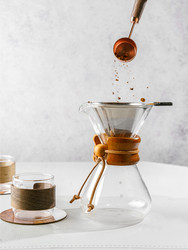 Preparing coffee in a pour‑over coffee maker - JuliaLavleis