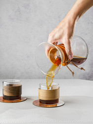 Preparing coffee in a pour‑over coffee maker - JuliaLavleis
