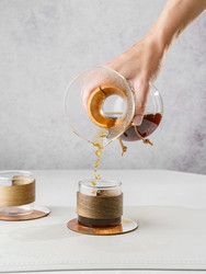 Preparing coffee in a pour‑over coffee maker - JuliaLavleis
