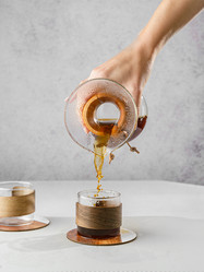Preparing coffee in a pour‑over coffee maker - JuliaLavleis