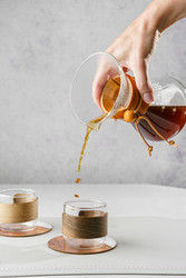 Preparing coffee in a pour‑over coffee maker - JuliaLavleis
