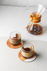 Preparing coffee in a pour‑over coffee maker - JuliaLavleis