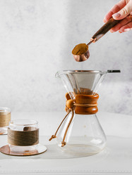 Preparing coffee in a pour‑over coffee maker - JuliaLavleis